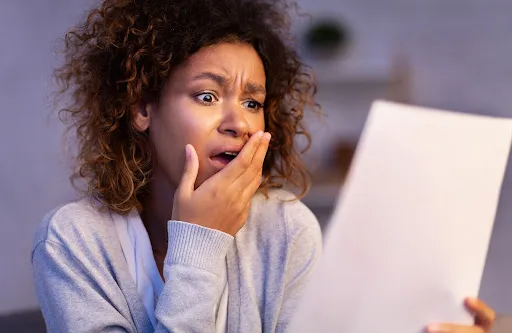 shocked girl | delinquent owner in HOA