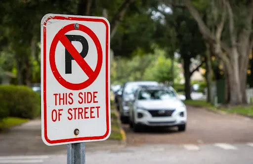 no parking sign | types of hoa fines