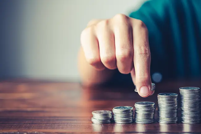 stack of coins | slush funds in hoa